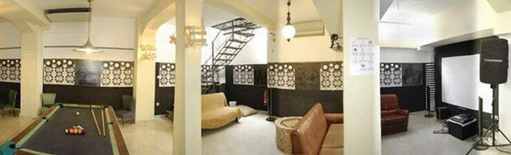 home cinema athens hostel games room cheap accommodation