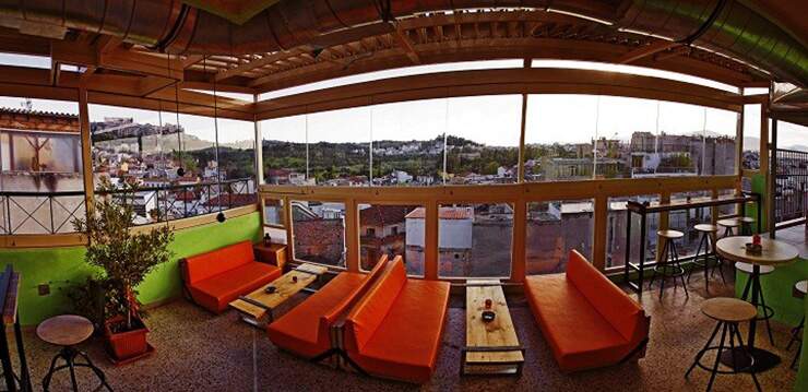 top greek hostel rooftop restaurant view to old athens