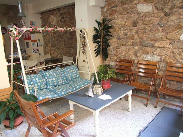 swing sofa table commoan area athenstyle hostel