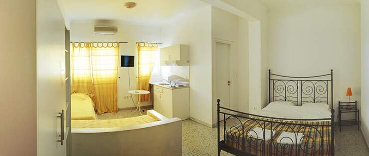 visit athens hostel with double iron bed