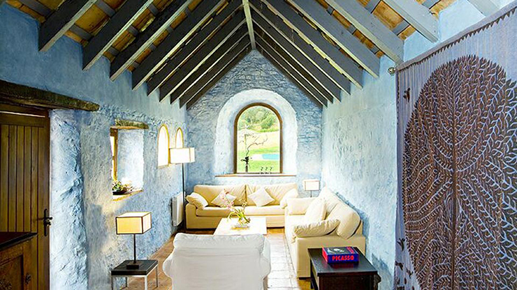 blue designed living room villa for rental in spain
