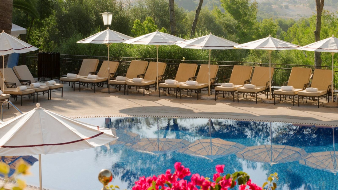 Relax at Palma de Mallorca Finest Hotel Beside the Outdoor Pool