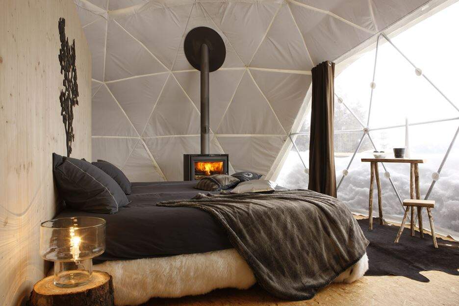 Every Dom Shaped Tent is with Comfortable King Size Bed and Wooden Burning Stove