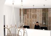 minimalistic designed reception desk hotel san giorgio mykonos