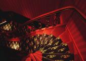 dark red staircase hotel amsterdam