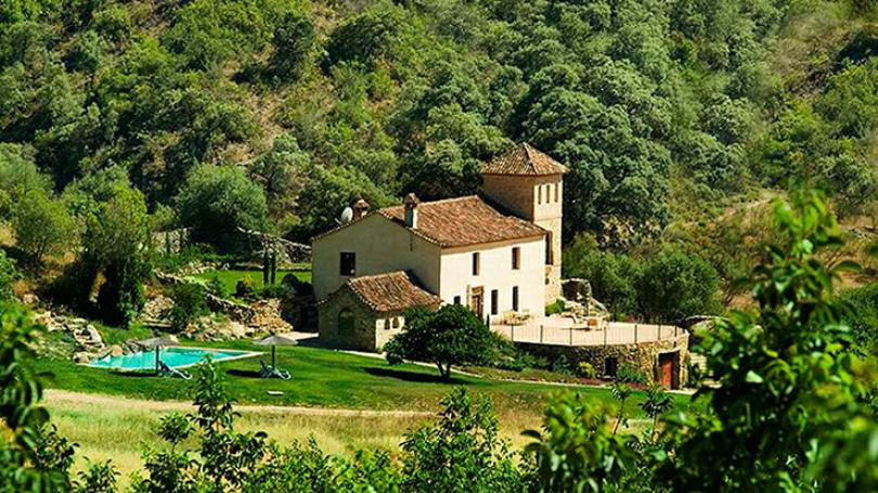 green spain countryside stone built villa
